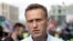 RUSSIA -- In this file photo taken on Saturday, July 20, 2019, Russian opposition activist Alexei Navalny attends a protest in Moscow, Russia. 