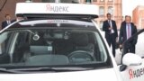 RUSSIA -- Russian President Vladimir Putin (R) examines a prototype of a self-driving car by Yandex as he tours the headquarters of Russia's IT company Yandex in Moscow, September 21, 2017