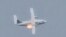 RUSSIA – MOSCOW REGION, AUGUST 17, 2021: An Ilyushin Il-112V military transport aircraft crashes during a training flight near the Kubinka airfield, its right engine on fire. UAC (United Aircraft Corporation) said it had three crew members on board. Video
