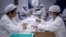 China - Workers package rabies vaccine at a lab at the Yisheng Biopharma company, where researchers are trying to develop a vaccine for the COVID-19 coronavirus, in Shenyang, in China's northeast Liaoning province, on June 9, 2020