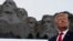 U.S. -- President Donald Trump smiles at Mount Rushmore National Memorial, Friday, July 3, 2020, near Keystone, S.D. 