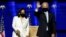 Democratic vice-presidential nominee Kamala Harris and Democratic 2020 U.S. presidential nominee Joe Biden greet supporters at an election rally, after news media announced that Biden has won the 2020 U.S. presidential election, in Wilmington, Delaware, U