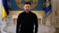 TOPSHOT - Ukraine's President Volodymyr Zelensky poses during a photo session on the sidelines of an interview with AFP journalists in Kyiv on February 20, 2026, amid the Russian invasion of Ukraine.