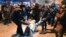 RUSSIA - Police officers detain a man at Moscow's Vnukovo airport where Russian opposition leader Alexei Navalny is expected to arrive, outside Moscow, Russia, Sunday, Jan. 17, 2021