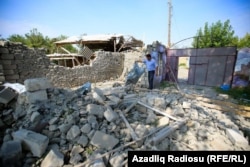 A destroyed home in Azerbaijan's Tartar district