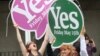 IRELAND -- People from the "Yes" campaign react as the results of the votes begin to come in, after the Irish referendum on the 8th Amendment of the Irish Constitution at Dublin Castle, in Dublin, Ireland, Saturday May 26, 2018.