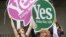 IRELAND -- People from the "Yes" campaign react as the results of the votes begin to come in, after the Irish referendum on the 8th Amendment of the Irish Constitution at Dublin Castle, in Dublin, Ireland, Saturday May 26, 2018.