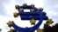 Euro Zone- ECB- A giant logo of the Euro currency stands in front of the European Central Bank (ECB) in the banking district of Frankfurt, western Germany, on October 9, 2012. The European Central Bank said Tuesday it will not simply print money to solv