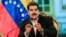 VENEZUELA -- Venezuelan President Nicolas Maduro talks during a meeting with Venezuelan diplomats returning from the US, at the Miraflores presidential palace in Caracas, Juanary 28, 2019