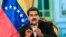 VENEZUELA -- Venezuelan President Nicolas Maduro talks during a meeting with Venezuelan diplomats returning from the US, at the Miraflores presidential palace in Caracas, Juanary 28, 2019