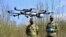 RUSSIA -- Russian Rosguardia (National Guard) soldiers operate a drone on Losiny Ostrov (Elk Island), in Moscow, May 3, 2020