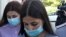 RUSSIA -- Verdict to be announced to two elder Khachaturyan sisters MOSCOW, RUSSIA - AUGUST 3, 2020: Sisters Krestina (L) and Angelina Khachaturyan, charged with complicity in the murder of their father, head for Moscow City Court ahead of a sentencing