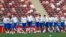Russia's national soccer team players warm up during the official training session of the Russian team one the eve of the group A match between Russia and Saudi Arabia at the 2018 soccer World Cup at Luzhniki stadium in Moscow, Russia, Wednesday, June 13,