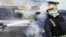 This handout picture taken and released by the Ukrainian State Emergency Service on September 13, 2026 shows firefighters spraying water at a train carriage damaged by a drone strike near the border with Poland.