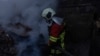 Ukraine -- Rescue workers at the site of Russian strike, Kyiv, 7Apr2025