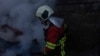 Ukraine -- Rescue workers at the site of Russian strike, Kyiv, 7Apr2025