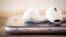 Belarus - closeup modern headphone on phone media portable, 2018