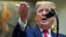 U.S. President Donald Trump answers questions from reporters about impeachment and Iran during an event to announce proposed rollbacks to the National Environmental Policy Act regulations in Roosevelt Room of the White House in Washington, U.S., January 9