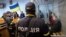UKRAINE – Russian soldiers Alexander Ivanov, right, and Alexander Bobykin attend their trial hearing in Kotelva, Poltava region, May 26, 2022